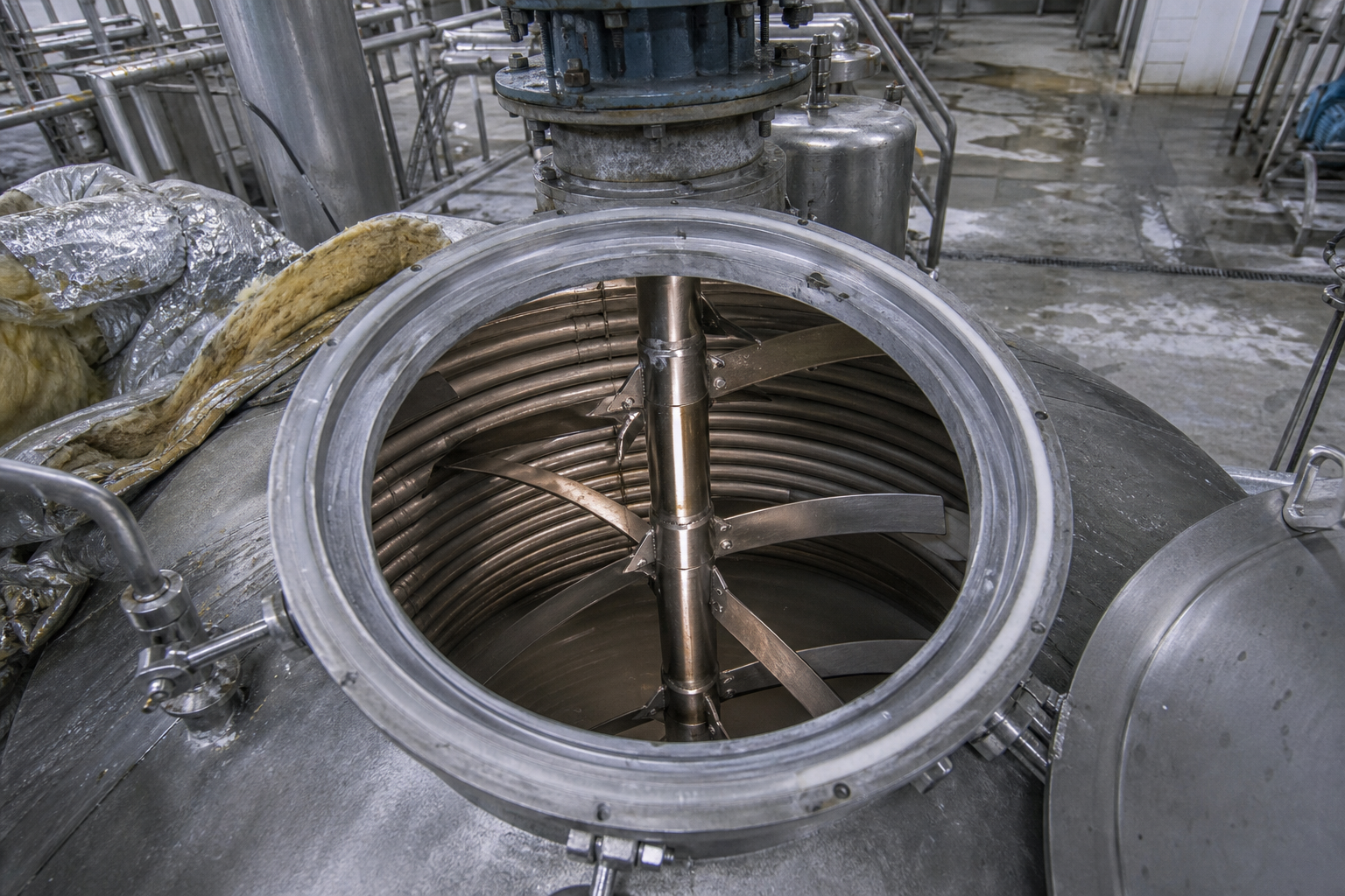 Cooling crystallizer agitator shaft and cooling coils inside stainless tank