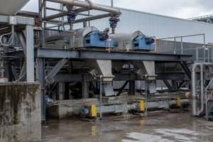 Crystal dewatering bay with horizontal decanter centrifuges on elevated steel frame
